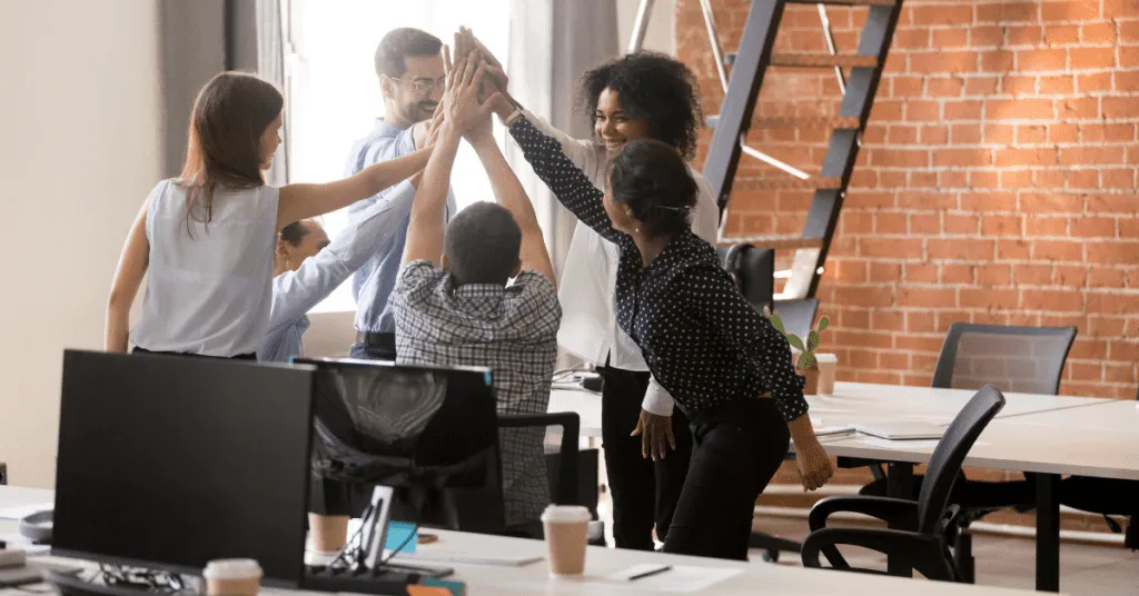 Group high fiving for motivation