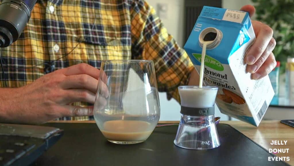 Almond Milk being poured on table during a latte tasting virtual event