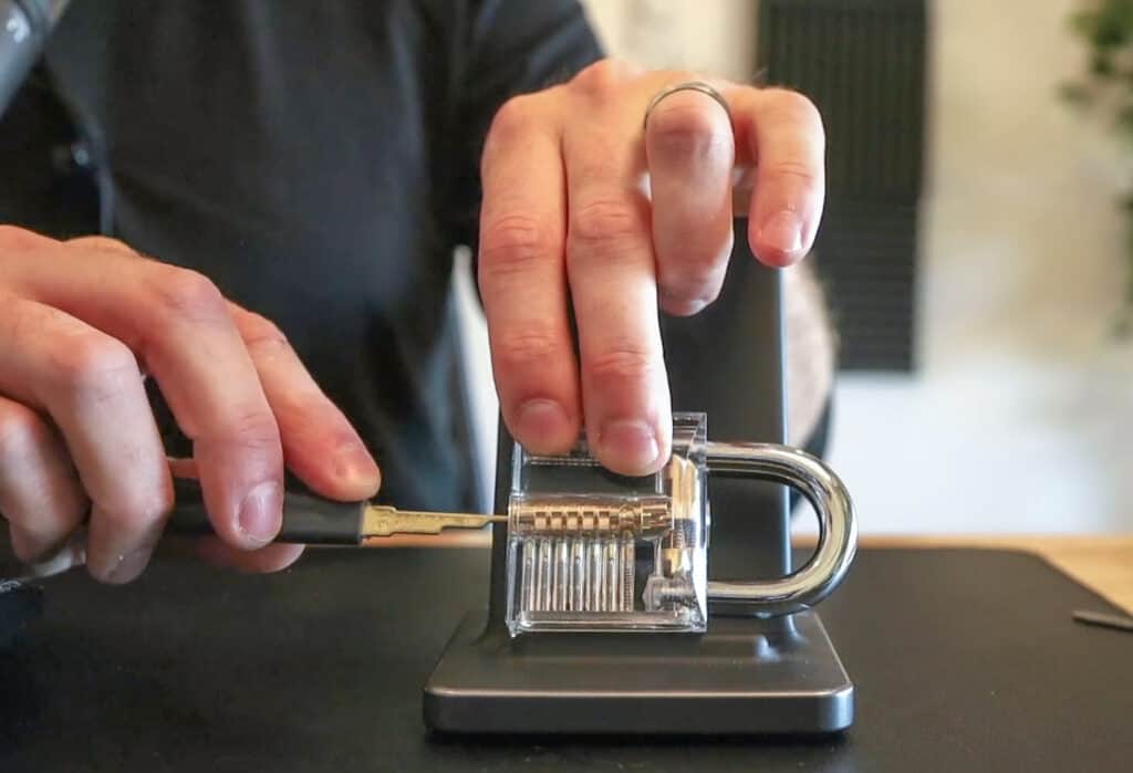 A padlock and pick in a learn lock picking virtual event