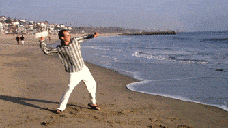 Man throwing letter into ocean